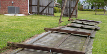 Fence,Damaged,And,Blown,Down,During,Severe,Weather