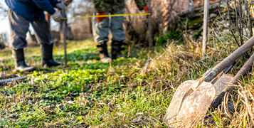 Men,People,With,Measuring,Tape,Working,On,Vegetable,Winter,Garden