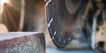 The,Circular,Diamond,Saw,Cuts,Concrete,Paving,Slabs.,Concrete,Cutting